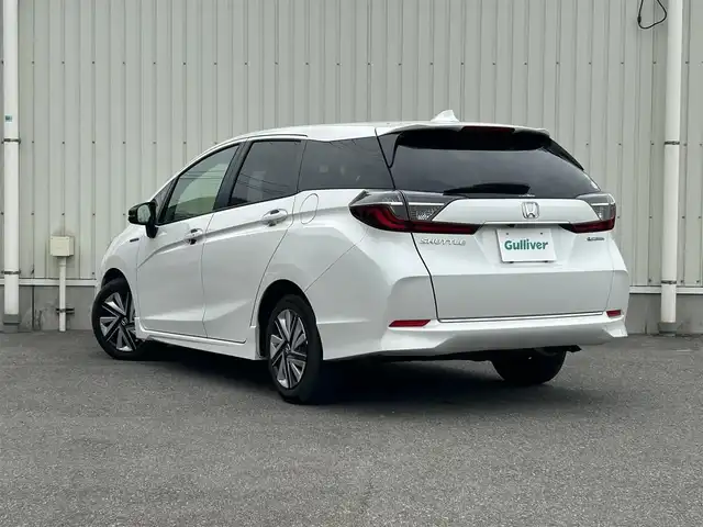 ホンダ シャトル ハイブリッド X ホンダセンシング 山形県 2020(令2)年 8万km プラチナホワイトパール ホンダセンシング/純正メモリナビ/　　【CD DVD BT フルセグ USB AUX】/バックカメラ/レーダークルーズコントロール/LEDオートヘッドライト/ハーフレザーシート/シートヒーター/アイドリングストップ/ステアリングスイッチ/パドルシフト/電動格納ウィンカーミラー/フォグランプ/スマートキー×2/ETC