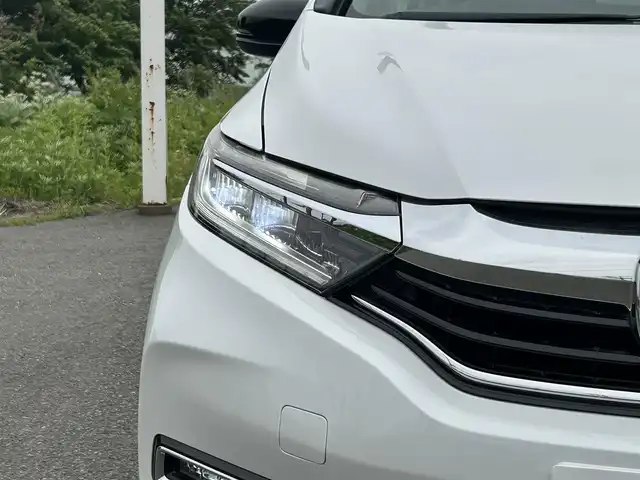 ホンダ シャトル ハイブリッド X ホンダセンシング 山形県 2020(令2)年 8万km プラチナホワイトパール ホンダセンシング/純正メモリナビ/　　【CD DVD BT フルセグ USB AUX】/バックカメラ/レーダークルーズコントロール/LEDオートヘッドライト/ハーフレザーシート/シートヒーター/アイドリングストップ/ステアリングスイッチ/パドルシフト/電動格納ウィンカーミラー/フォグランプ/スマートキー×2/ETC