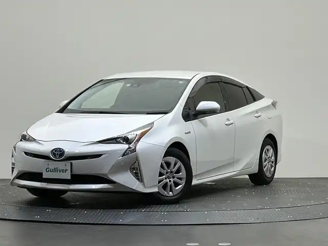 トヨタ プリウス Sセーフティプラス 愛媛県 2017(平29)年 1.8万km ホワイトパールクリスタルシャイン 登録時17968km/純正9インチメモリーナビ/フルセグ/バックカメラ/トヨタセーフティセンス/レーダークルーズコントロール/レーンキープアシスト/プリクラッシュセーフティ/ハイビームアシスト/インテリジェントパーキングアシスト/LEDヘッドライト/プッシュスタート/ETC/ドライブレコーダー/スマートキー/禁煙車