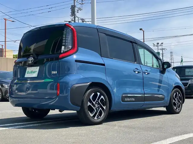 トヨタ シエンタ ハイブリッド Z 静岡県 2022(令4)年 2.7万km グレイッシュブルー エンジンスタートボタン/スマートキー/スペアキー2本/パワーステアリング/パワーウィンドウ/保証書/取扱説明書/記録簿/100V充電/アイドリングストップ/オートエアコン/クルーズコントロール/ETC/USB入力端子/全方位カメラ/純正10.5インチナビ（CD.BT.フルセグ）/ドライブレコーダー前後/ウォークスルー/純正アルミホイール/純正フロアマット/D席N席シートヒーター/両側パワースライドドア/ABS/横滑り防止装置/コーナーセンサー前後/レーンキープアシスト/オートライト/オートマチックハイビーム/LEDライト/W+サイドエアバック/衝突軽減システム/ステアリングヒーター/純正シートカバー/純正リモートスタート/社外アルミホイール車内有（スタッドレスタイヤ）