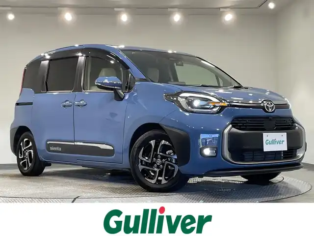 トヨタ シエンタ ハイブリッド Z 愛知県 2022(令4)年 2.7万km グレイッシュブルー 純正１０，５インチナビ　/(Bluetooth/フルセグTV/FM/AM/CarPlay/Miracast)/パノラミックビューモニター　/サーキュレーター　/コンフォートパッケージ　/　　-シートヒーター　/　　-ステアリングヒーター　/トヨタセーフティセンス/　　-レーダークルーズコントロール/　　-プリクラッシュセーフティ―/　　-レーンディパーチャーアラート/　　-標識認識機能/　　-先行車発進告知機能/両側パワースライドドア/ＡＣ１００Ｖ　/ブラインドスポットモニター　/ビルトインＥＴＣ　/純正１５インチＡＷ　/ＬＥＤヘッドライト/LEDフォグランプ/ドライブレコーダー