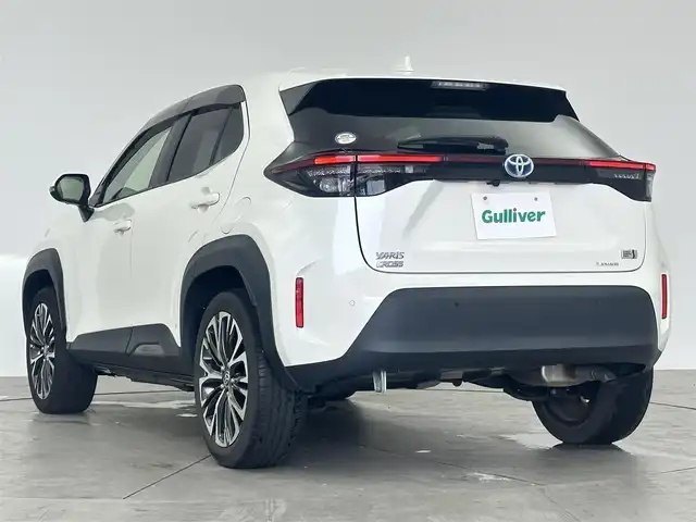 トヨタ ヤリスクロス ハイブリッド Z 愛知県 2021(令3)年 6.8万km ホワイトパールクリスタルシャイン 純正8インチコネクテッドナビ付ディスプレイオーディオ/フルセグTV/パノラミックビューモニター/ビルトインETC/ステアリングリモコン/パワーシート（Ｄ席）/シートヒーター（前席）/ハーフレザーシート/パワーバックドア/モデリスタラゲージLED/トヨタセーフティセンス/　　・プリクラッシュセーフティ/　　・レーントレーシングアシスト/　　・レーダークルーズコントロール/　　・レーンディバーチャーアラート/　　・ロードサインアシスト/　　・オートマチックハイビーム/クリアランスソナー/取扱説明書/スマートキー/スペアキー/ドアバイザー