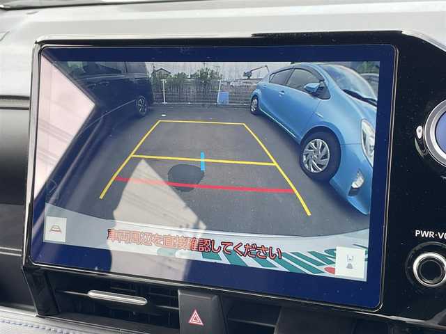 トヨタ ヴォクシー ハイブリッド S－Z 茨城県 2023(令5)年 0.9万km ホワイトパールクリスタルシャイン 純正ナビ/【AM・FM・TV・BT・USB・ＣＤ・ＤＶＤ】/快適利便パッケージHigh/ハンズフリーデュアルパワースライドドア（挟み込み防止機能付）/パワーバックドア（挟み込み防止機能・停止位置メモリー機能・パワーバックドアスイッチ〈車両サイド〉付）/ナノイーX/ステアリングヒーター/キャプテンシート追加機能：シートヒーター、オットマン（2WD車のみ）、角度調整付アームレスト（2WD車のみ）/電動リアゲート/両側パワスラ/BSM/HUD/デジタルインナーミラー/レーダークルコン/Ｂカメラ/ETC2.0/前方ドラレコ/前後コーナーセンサー/ブレーキホールド/100V電源