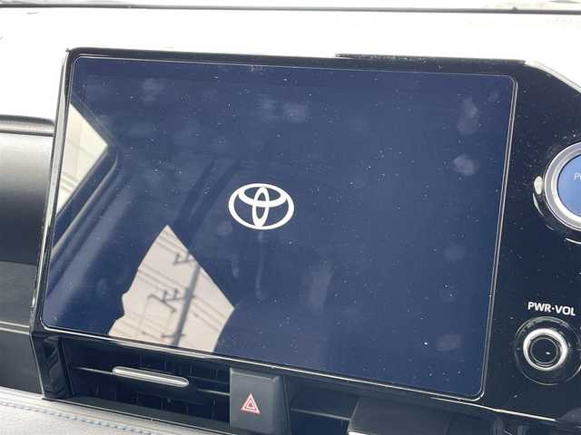 トヨタ ヴォクシー ハイブリッド S－Z 茨城県 2023(令5)年 0.9万km ホワイトパールクリスタルシャイン 純正ナビ/【AM・FM・TV・BT・USB・ＣＤ・ＤＶＤ】/快適利便パッケージHigh/ハンズフリーデュアルパワースライドドア（挟み込み防止機能付）/パワーバックドア（挟み込み防止機能・停止位置メモリー機能・パワーバックドアスイッチ〈車両サイド〉付）/ナノイーX/ステアリングヒーター/キャプテンシート追加機能：シートヒーター、オットマン（2WD車のみ）、角度調整付アームレスト（2WD車のみ）/電動リアゲート/両側パワスラ/BSM/HUD/デジタルインナーミラー/レーダークルコン/Ｂカメラ/ETC2.0/前方ドラレコ/前後コーナーセンサー/ブレーキホールド/100V電源
