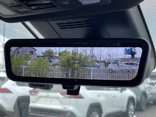 トヨタ ヴォクシー ハイブリッド S－Z 茨城県 2023(令5)年 0.9万km ホワイトパールクリスタルシャイン 純正ナビ/【AM・FM・TV・BT・USB・ＣＤ・ＤＶＤ】/快適利便パッケージHigh/ハンズフリーデュアルパワースライドドア（挟み込み防止機能付）/パワーバックドア（挟み込み防止機能・停止位置メモリー機能・パワーバックドアスイッチ〈車両サイド〉付）/ナノイーX/ステアリングヒーター/キャプテンシート追加機能：シートヒーター、オットマン（2WD車のみ）、角度調整付アームレスト（2WD車のみ）/電動リアゲート/両側パワスラ/BSM/HUD/デジタルインナーミラー/レーダークルコン/Ｂカメラ/ETC2.0/前方ドラレコ/前後コーナーセンサー/ブレーキホールド/100V電源