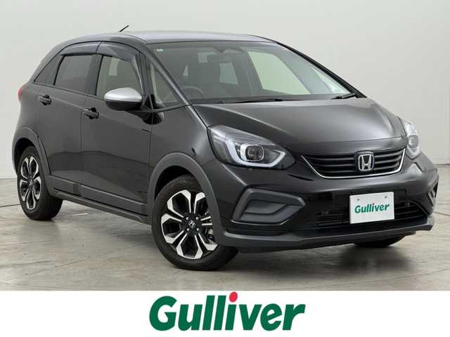 ホンダ フィット e:HEVクロスター 福岡県 2020(令2)年 0.7万km クリスタルブラックパール 純正８型ナビ／フルセグＴＶ　/バックカメラ　/アダプティブクルコン　/コーナーセンサー　/衝突軽減ブレーキ　/レーンキープ　/アクセル踏み間違い防止　/ＥＣＯＮ　/プッシュスタート　/純正１６インチＡＷ　/ＬＥＤライト