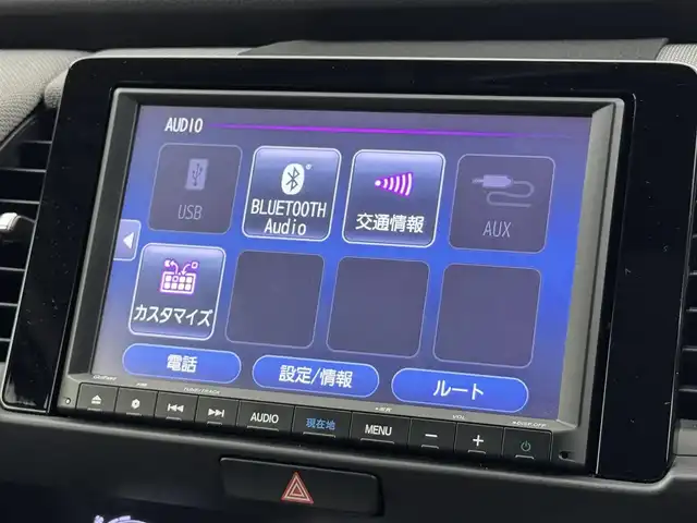 ホンダ フィット e:HEVクロスター 福岡県 2020(令2)年 0.7万km クリスタルブラックパール 純正８型ナビ／フルセグＴＶ　/バックカメラ　/アダプティブクルコン　/コーナーセンサー　/衝突軽減ブレーキ　/レーンキープ　/アクセル踏み間違い防止　/ＥＣＯＮ　/プッシュスタート　/純正１６インチＡＷ　/ＬＥＤライト