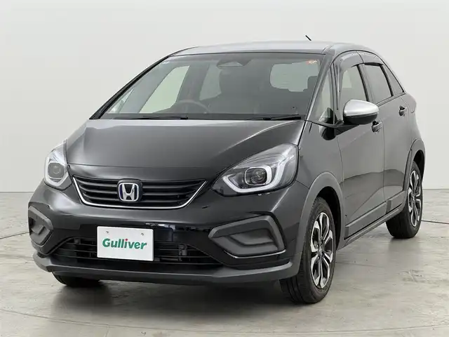 ホンダ フィット e:HEVクロスター 福岡県 2020(令2)年 0.7万km クリスタルブラックパール 純正８型ナビ／フルセグＴＶ　/バックカメラ　/アダプティブクルコン　/コーナーセンサー　/衝突軽減ブレーキ　/レーンキープ　/アクセル踏み間違い防止　/ＥＣＯＮ　/プッシュスタート　/純正１６インチＡＷ　/ＬＥＤライト