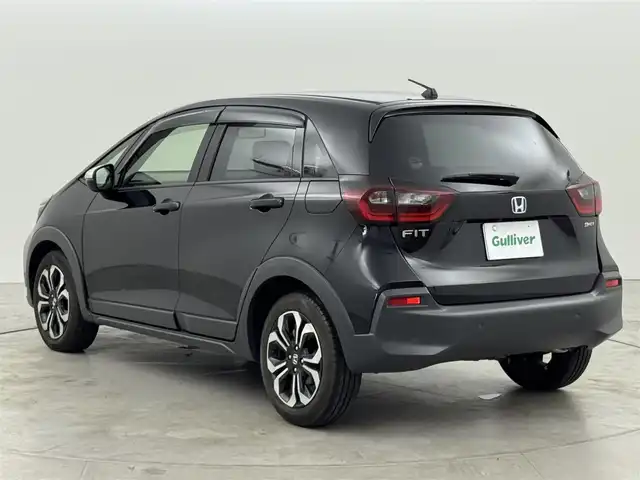 ホンダ フィット e:HEVクロスター 福岡県 2020(令2)年 0.7万km クリスタルブラックパール 純正８型ナビ／フルセグＴＶ　/バックカメラ　/アダプティブクルコン　/コーナーセンサー　/衝突軽減ブレーキ　/レーンキープ　/アクセル踏み間違い防止　/ＥＣＯＮ　/プッシュスタート　/純正１６インチＡＷ　/ＬＥＤライト