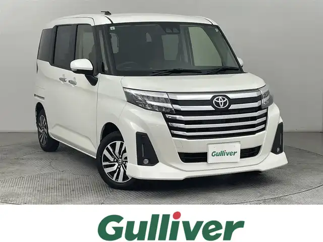 トヨタ ルーミー カスタムG 道央・札幌 2024(令6)年 1.8万km パールホワイトⅢ ・４WD/・寒冷地仕様/・社外メモリナビ/　BT／USB／フルセグ/・社外ETC/・バックカメラ/・レーダークルーズコントロール/・プリクラッシュセーフティ/・レーンキープアシスト/・横滑り防止/・前後コーナーセンサー/・アイドリングストップ/・両側パワースライドドア/・社外フロアマット/・純正サマー14インチAW/・LEDヘッドライト/・オートライト/・オートマチックハイビーム/・プッシュスタート/・スマートキー