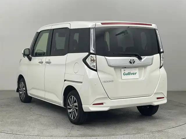 トヨタ ルーミー カスタムG 道央・札幌 2024(令6)年 1.8万km パールホワイトⅢ ・４WD/・寒冷地仕様/・社外メモリナビ/　BT／USB／フルセグ/・社外ETC/・バックカメラ/・レーダークルーズコントロール/・プリクラッシュセーフティ/・レーンキープアシスト/・横滑り防止/・前後コーナーセンサー/・アイドリングストップ/・両側パワースライドドア/・社外フロアマット/・純正サマー14インチAW/・LEDヘッドライト/・オートライト/・オートマチックハイビーム/・プッシュスタート/・スマートキー