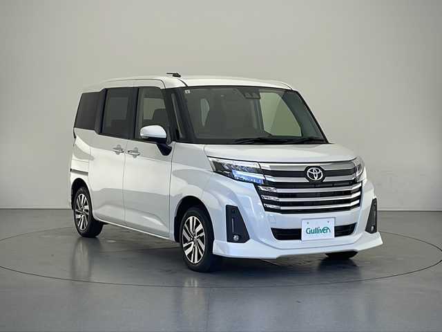 トヨタ ルーミー カスタムG 長野県 2024(令6)年 1.8万km パールホワイトⅢ ・４WD/・寒冷地仕様/・社外メモリナビ/　BT／USB／フルセグ/・社外ETC/・バックカメラ/・レーダークルーズコントロール/・プリクラッシュセーフティ/・レーンキープアシスト/・横滑り防止/・前後コーナーセンサー/・アイドリングストップ/・両側パワースライドドア/・社外フロアマット/・純正サマー14インチAW/・LEDヘッドライト/・オートライト/・オートマチックハイビーム/・プッシュスタート/・スマートキー