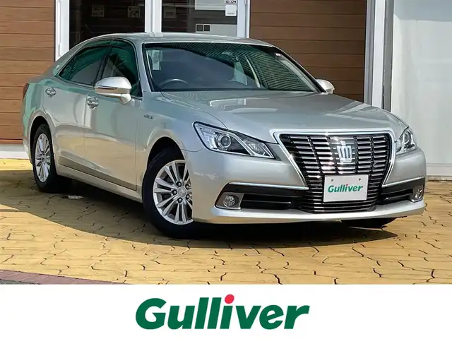 トヨタ クラウン ハイブリッド ロイヤルサルーン 宮崎県 2013(平25)年 8.4万km プレシャスシルバー 純正8型ナビ/フルセグTV/バックモニター/ビルトインETC/ドライブレコーダー/アドバンストパッケージ/・レーダークルーズコントロール/・ インテリジェントクリアランスソナー/・ バックソナー/・ 衝突被害軽減ブレーキ/HIDヘッドランプ/オートライト/LEDフロントフォグランプ/革巻きステアリング/ステアリングヒーター/純正OPブラウンファブリックシート/前席パワーシート/シートヒーター/純正16インチアルミホイール/スマートキー/プッシュエンジンスタート/禁煙車
