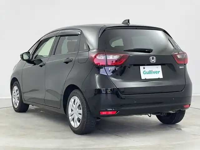 ホンダ フィット e:HEVホーム 新潟県 2021(令3)年 5.3万km クリスタルブラックパール 純正メモリナビ【VXU-215FTi】/　フルセグTV/Bluetooth/CD/DVD/ホンダセンシング/・衝突被害軽減ブレーキ/・誤発進抑制機能/・後方誤発進抑制機能/・近距離衝突軽減ブレーキ/・歩行者事故低減ステアリング/・路外逸脱抑制機能/・渋滞追従機能付アダプティブ・クルーズ・コントロール/・車線維持支援システム/・先行車発進お知らせ機能/・標識認識機/・オートマチックハイビーム/ハーフレザーシート/前後コーナーセンサー/前後ドライブレコーダー/バックモニター/ビルトインETC/LEDヘッドライト/レザーステアリング/ステアリングスイッチ