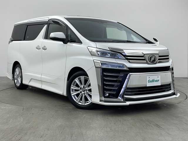 トヨタ ヴェルファイア Z 兵庫県 2019(令1)年 5.4万km ホワイトパールクリスタルシャイン ・ワンオーナー車/・純正ナビ（フルセグ・BT・DVD・CD・SD）/・バックカメラ/・トヨタセーフティセンス/・プリクラッシュセーフティ/・レーントレーシングアシスト/・レーダークルーズコントロール/・ロードサインアシスト/・オートマチックハイビーム/・クリアランスソナー/・ドライブスタートコントロール/・電動パーキングブレーキ/・オートホールド/・Wサンルーフ/・ステアリングスイッチ/・MTモード付AT/・LEDヘッドライト/・LEDフォグランプ/・オートライト/・純正エアロ/・両側パワースライドドア/・純正フロアマット/・純正18インチアルミホイール/・ビルトインETC/・前後ドライブレコーダー/・GPSレーダー探知機/・横滑り防止/・スマートキー/・スペアキー/・プッシュスタート/・ワンオーナー/・取扱説明書/・保証書/・スペアタイヤ