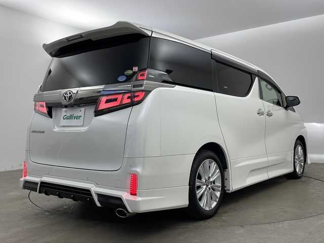 トヨタ ヴェルファイア Z 兵庫県 2019(令1)年 5.4万km ホワイトパールクリスタルシャイン ・ワンオーナー車/・純正ナビ（フルセグ・BT・DVD・CD・SD）/・バックカメラ/・トヨタセーフティセンス/・プリクラッシュセーフティ/・レーントレーシングアシスト/・レーダークルーズコントロール/・ロードサインアシスト/・オートマチックハイビーム/・クリアランスソナー/・ドライブスタートコントロール/・電動パーキングブレーキ/・オートホールド/・Wサンルーフ/・ステアリングスイッチ/・MTモード付AT/・LEDヘッドライト/・LEDフォグランプ/・オートライト/・純正エアロ/・両側パワースライドドア/・純正フロアマット/・純正18インチアルミホイール/・ビルトインETC/・前後ドライブレコーダー/・GPSレーダー探知機/・横滑り防止/・スマートキー/・スペアキー/・プッシュスタート/・ワンオーナー/・取扱説明書/・保証書/・スペアタイヤ