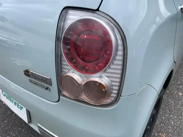 スズキ ラパン ショコラ X 新潟県 2013(平25)年 12.5万km アロマティックアクアメタリック 4WD/メモリナビ/ワンセグテレビ/バックカメラ/アイドリングストップ/ウィンカーミラー/ドアバイザー/プッシュスタート/純正フロアマット/運転席シートヒーター/スペアキー1個