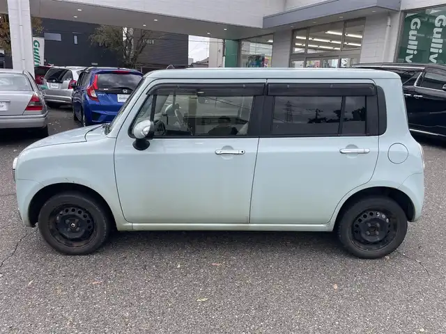 スズキ ラパン ショコラ X 新潟県 2013(平25)年 12.5万km アロマティックアクアメタリック 4WD/メモリナビ/ワンセグテレビ/バックカメラ/アイドリングストップ/ウィンカーミラー/ドアバイザー/プッシュスタート/純正フロアマット/運転席シートヒーター/スペアキー1個