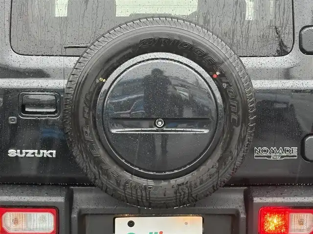スズキ ジムニー ノマド 岩手県 2025(令7)年 0.1千km 黒 登録済み未使用車/4WD/シートヒーター/追従型クルーズコントロール/ダウンヒルアシスト/オートライト/ＬＥＤヘッドライト/フォグライト/先進運転支援システム（ＡＤＡＳ）/レーンキープアシスト/〇プッシュスタート/〇電動格納ミラー/スペアキー/取扱説明書/保証書