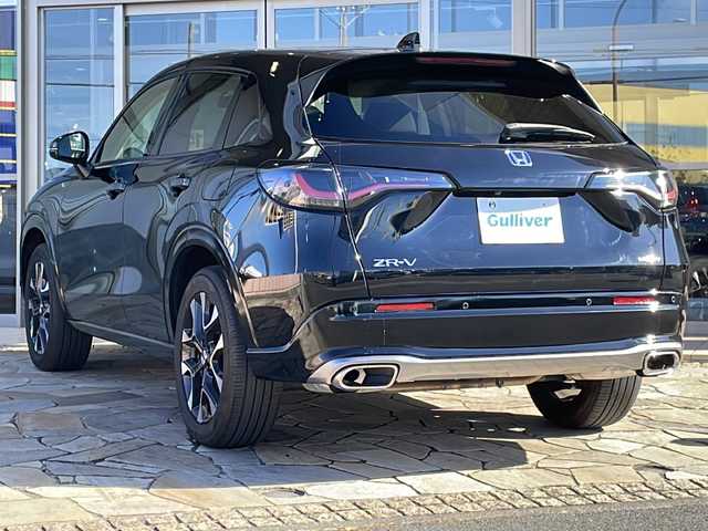 ホンダ ＺＲ－Ｖ ハイブリッド e:HEV Z 静岡県 2023(令5)年 2万km クリスタルブラックパール 純正ナビ/・ラジオ/フルセグTV/・USB/Bluetooth/Apple Carplay/Android Auto/主要装備/・全方位カメラ　/・ドライブレコーダー　/・ＥＴＣ２．０　/・レーダークルーズコントロール　/・ホンダセンシング　/・ＢＯＳＥプレミアムサウンドシステム　/・シートヒーター　/・ハンドルヒーター/・置くだけ充電　/・フォグランプ/・レザーシート/・パワーシート/・パワーバックドア/・パドルシフト/・ダウンヒルコントロール/・オートホールド/・SOSコール/・レーンキープアシスト/・コーナーセンサー/・純正アルミホイール/・プッシュスタート/・スマートキー
