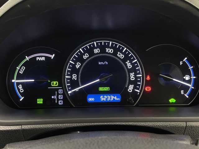 トヨタ エスクァイア ハイブリッド Gi プレミアムパッケージ 宮崎県 2018(平30)年 5.3万km ホワイトパールクリスタルシャイン ・トヨタセーフティセンス/・レーンキープアシスト/・オートハイビーム/・純正9インチナビ（Bluetooth/フルセグTV/SD/AM/FM/CD/DVD）/・純正12.1インチフリップダウンモニター/・バックカメラ/・両側パワースライドドア/・クルーズコントロール/・ハーフレザーシート/・前席シートヒーター/・ハンドルヒーター/・オートライト/・オートハイビーム/・スマートキー/プッシュスタート/・純正フロアマット/・ドライブレコーダー/・ビルトインETC2.0