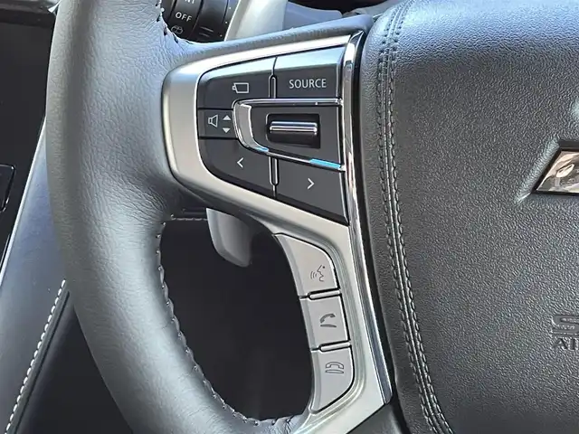 三菱 デリカＤ：５ シャモニー 東京都 2025(令7)年 0.1千km ホワイトダイヤモンド 登録済未使用車　/アルパイン１１インチナビ/・BluetoothAudio/HDNMI/USB/・CD/SD/DVD/AM/FM　/純正１２．８インチフリップダウンモニター/バックカメラ　/両側パワースライドドア　/ハーフレザーシート　/・シートヒーター　/ｅ－Ａｓｓｉｓｔ　/（予防安全技術）/・衝突被害軽減ブレーキ/・車線逸脱警報システム/・レーダークルーズコントロール/・オートマチックハイビーム/・誤発進抑制機能/ＬＥＤヘッドライト　/プッシュスマートキー/スマートキー/スペアキーX1/保証書＆取説