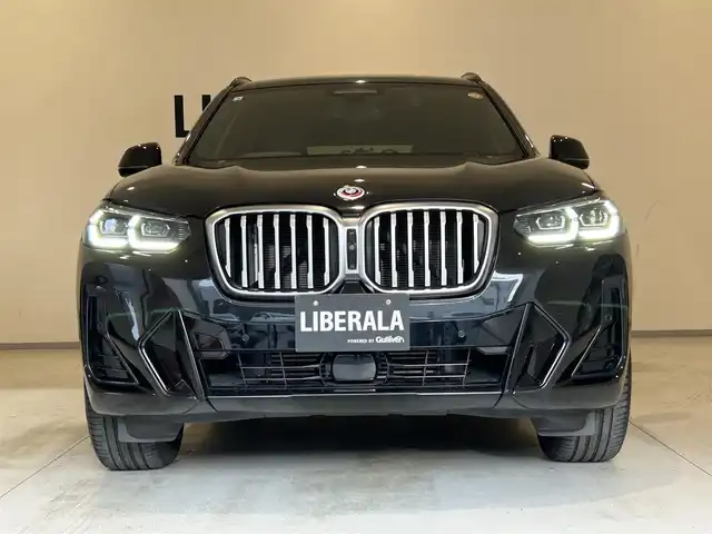 ＢＭＷ Ｘ３ xDrive20d Mスポーツ 熊本県 2022(令4)年 3.7万km サファイアブラックP パノラマサンルーフ/ブラウンレザーシート/全席シートヒーター/シートメモリー/ハンドルヒーター/純正HDDナビ/CarPlay/USB/Bluetooth/フルセグテレビ/ハーマンカードンプレミアムサラウンドシステム/置くだけ充電（ワイヤレス充電）/パワーバックドア/ETC2.0/前後ドライブレコーダー/インテリジェントセーフティー/アダプティブクルーズコントロール/オートマチックハイビーム/【ブラックサファイアメタリック】