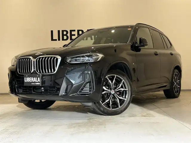 ＢＭＷ Ｘ３ xDrive20d Mスポーツ 熊本県 2022(令4)年 3.7万km サファイアブラックP パノラマサンルーフ/ブラウンレザーシート/全席シートヒーター/シートメモリー/ハンドルヒーター/純正HDDナビ/CarPlay/USB/Bluetooth/フルセグテレビ/ハーマンカードンプレミアムサラウンドシステム/置くだけ充電（ワイヤレス充電）/パワーバックドア/ETC2.0/前後ドライブレコーダー/インテリジェントセーフティー/アダプティブクルーズコントロール/オートマチックハイビーム/【ブラックサファイアメタリック】