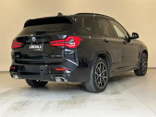 ＢＭＷ Ｘ３ xDrive20d Mスポーツ 熊本県 2022(令4)年 3.7万km サファイアブラックP パノラマサンルーフ/ブラウンレザーシート/全席シートヒーター/シートメモリー/ハンドルヒーター/純正HDDナビ/CarPlay/USB/Bluetooth/フルセグテレビ/ハーマンカードンプレミアムサラウンドシステム/置くだけ充電（ワイヤレス充電）/パワーバックドア/ETC2.0/前後ドライブレコーダー/インテリジェントセーフティー/アダプティブクルーズコントロール/オートマチックハイビーム/【ブラックサファイアメタリック】