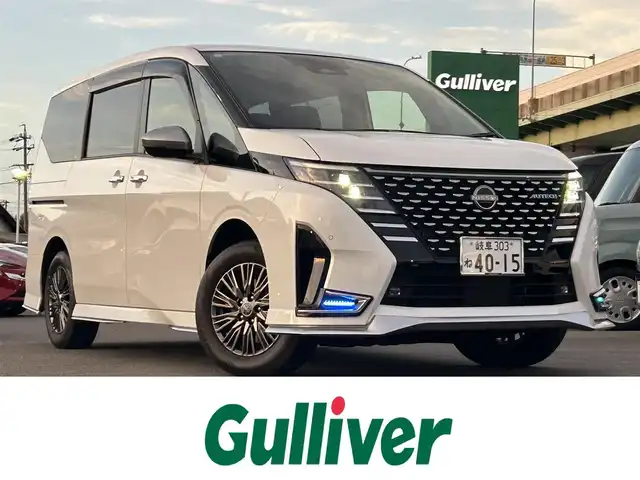 日産 セレナ オーテック 愛知県 2023(令5)年 2.6万km プリズムホワイト デジタルインナーミラー /プロパイロット /純正12.3インチナビ/（FM/AM/CD/DVD/フルセグTV/BT/HDMI）/アラウンドビューモニター/純正11インチフリップダウンモニター/ビルトイン2.0ETC/純正16インチAW/両側パワースライドドア /レーダークルーズコントロール/ハンドル支援/ブラインドスポットモニター/純正ドライブレコーダー/純正フロアマット/純正ドアバイザー/レザーシート/シートヒーター /取説、保証書/スペアキー