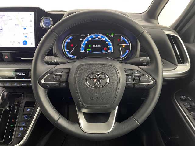 トヨタ ヴォクシー ハイブリッド S－Z 大阪府 2022(令4)年 2.9万km スパークリングブラックパールクリスタルシャイン 純正10.5型ナビ/・Bluetooth/・CD/DVD/・フルセグテレビ/バックカメラ/純正14インチフリップダウンモニター/両側パワースライドドア/シートヒーター/ハーフレザーシート/衝突軽減ブレーキ/レーンキープアシスト/オートマチックハイビーム/レーダークルーズコントロール/ビルトインETC2.0/LEDヘッドライト