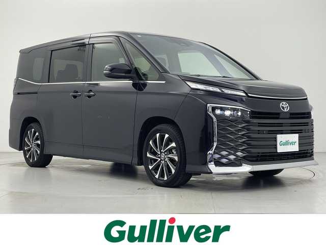 トヨタ ヴォクシー ハイブリッド S－Z 大阪府 2022(令4)年 2.9万km スパークリングブラックパールクリスタルシャイン 純正10.5型ナビ/・Bluetooth/・CD/DVD/・フルセグテレビ/バックカメラ/純正14インチフリップダウンモニター/両側パワースライドドア/シートヒーター/ハーフレザーシート/衝突軽減ブレーキ/レーンキープアシスト/オートマチックハイビーム/レーダークルーズコントロール/ビルトインETC2.0/LEDヘッドライト