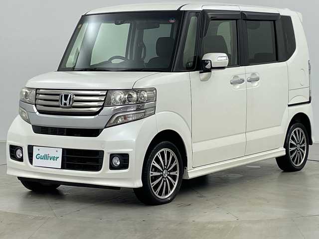 ホンダ Ｎ ＢＯＸ カスタム ターボ SSパッケージ 道央・札幌 2014(平26)年 4.9万km プレミアムホワイトパール ・純正ナビ&CD&DVD&BT&SD&TV/・両側パワースライドドア/・バックカメラ/・クルーズコントロール/・横滑り防止装置/・アイドリングストップ/・前席シートヒーター/・パドルシフト/・ドアミラーヒーター/・純正フロアマット/・ステアリングスイッチ/・ドアバイザー/・プッシュスタート/・HIDヘッドライト/・フォグランプ/・オートライト/・スマートキー