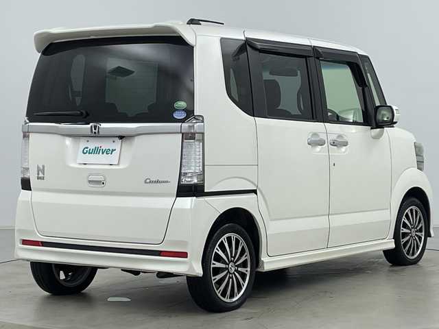 ホンダ Ｎ ＢＯＸ カスタム ターボ SSパッケージ 道央・札幌 2014(平26)年 4.9万km プレミアムホワイトパール ・純正ナビ&CD&DVD&BT&SD&TV/・両側パワースライドドア/・バックカメラ/・クルーズコントロール/・横滑り防止装置/・アイドリングストップ/・前席シートヒーター/・パドルシフト/・ドアミラーヒーター/・純正フロアマット/・ステアリングスイッチ/・ドアバイザー/・プッシュスタート/・HIDヘッドライト/・フォグランプ/・オートライト/・スマートキー