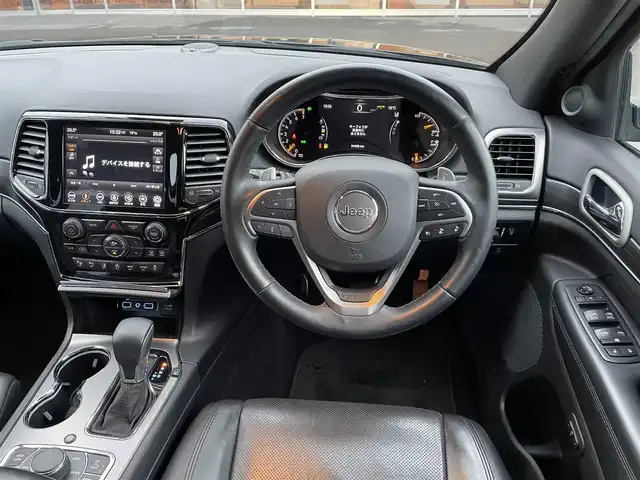クライスラー・ジープ ジープ グランドチェロキー LTD 岐阜県 2021(令3)年 3.5万km 黒 純正ナビゲーション/Bluetooth/USB/Apple CarPlay/Android Auto/アルパイン製プレミアムサウンドシステム/アルパインフリップダウンモニター/社外DVDプレーヤー/アダプティブクルーズコントロール/前面衝突警報/車線逸脱警報プラス/ブラインドスポットモニター /ParkSense縦列、並列パークアシスト/セレクテレインシステム/クォドラリフトエアサスペンション/クォドラトラックII/バイキセノンヘッドライト/ベンチレーテッドフロントシート/フロント8ウェイパワーシート（運転席メモリー機能付）