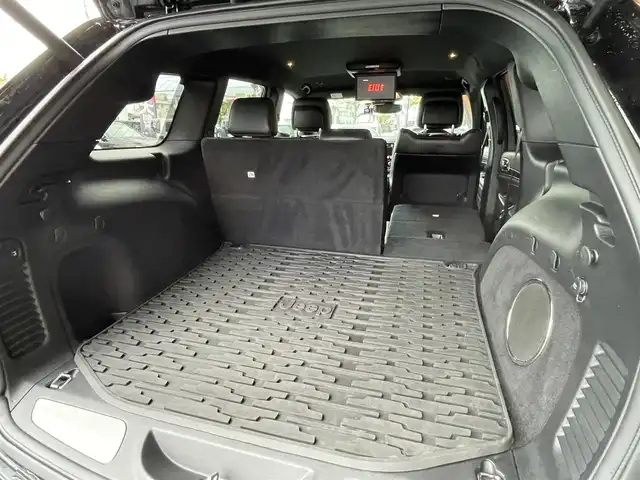 クライスラー・ジープ ジープ グランドチェロキー LTD 岐阜県 2021(令3)年 3.5万km 黒 純正ナビゲーション/Bluetooth/USB/Apple CarPlay/Android Auto/アルパイン製プレミアムサウンドシステム/アルパインフリップダウンモニター/社外DVDプレーヤー/アダプティブクルーズコントロール/前面衝突警報/車線逸脱警報プラス/ブラインドスポットモニター /ParkSense縦列、並列パークアシスト/セレクテレインシステム/クォドラリフトエアサスペンション/クォドラトラックII/バイキセノンヘッドライト/ベンチレーテッドフロントシート/フロント8ウェイパワーシート（運転席メモリー機能付）