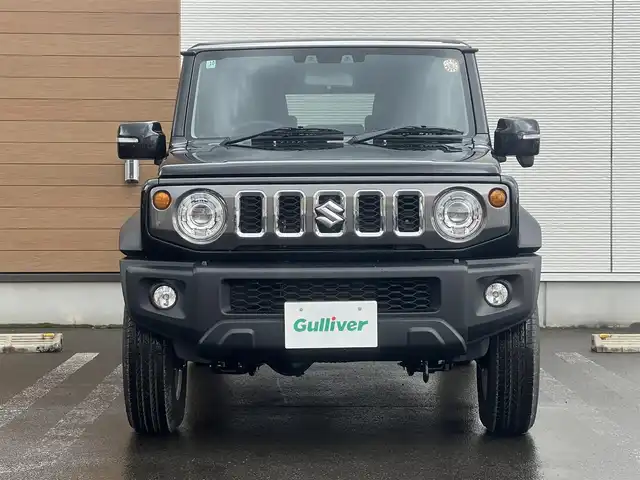 スズキ ジムニー ノマド FC 秋田県 2025(令7)年 0.1千km 黒 ４WD/衝突軽減システム/LEDヘッドライト/スズキ純正１５インチアルミ（夏タイヤ装着）/スマートキー/アイドリングストップ/プッシュスタート/コーナーセンサー/レーンキープアシスト/クルーズコントロール追従走行有/オートマチックハイビーム/ダウンヒルアシストコントロール/ヘッドライトウォッシャー/ステアリングスイッチ/前席シートヒーター/センターデフロック/背面タイヤ/純正フロアマット/オートライト/オートエアコン/パワーステアリング/パワーウィンドウ/ヘッドライトレベライザー/横滑り防止/盗難防止装置/寒冷地仕様/電動格納ウィンカーミラー/保証書/取扱説明書/記録簿/スペアキー×１