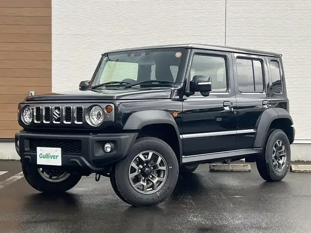 スズキ ジムニー ノマド FC 秋田県 2025(令7)年 0.1千km 黒 ４WD/衝突軽減システム/LEDヘッドライト/スズキ純正１５インチアルミ（夏タイヤ装着）/スマートキー/アイドリングストップ/プッシュスタート/コーナーセンサー/レーンキープアシスト/クルーズコントロール追従走行有/オートマチックハイビーム/ダウンヒルアシストコントロール/ヘッドライトウォッシャー/ステアリングスイッチ/前席シートヒーター/センターデフロック/背面タイヤ/純正フロアマット/オートライト/オートエアコン/パワーステアリング/パワーウィンドウ/ヘッドライトレベライザー/横滑り防止/盗難防止装置/寒冷地仕様/電動格納ウィンカーミラー/保証書/取扱説明書/記録簿/スペアキー×１