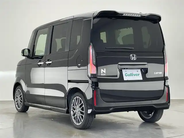 ホンダ Ｎ ＢＯＸ カスタム ターボ 愛知県 2024(令6)年 0.1千km クリスタルブラックパール 届出済未使用車　社外８型ナビ　禁煙車　バックカメラ　シートヒーター　ハーフレザー　両側パワスラ　ＥＴＣ　パドルシフト　ホンダセンシング　衝突軽減装置　追従クルコン　コーナーセンサー　リアロールシェード　コンビニフック付シートバックテーブル(運転席＆助手席)/登録時走行距離27km