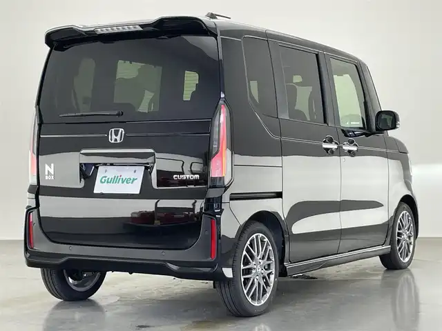 ホンダ Ｎ ＢＯＸ カスタム ターボ 愛知県 2024(令6)年 0.1千km クリスタルブラックパール 届出済未使用車　社外８型ナビ　禁煙車　バックカメラ　シートヒーター　ハーフレザー　両側パワスラ　ＥＴＣ　パドルシフト　ホンダセンシング　衝突軽減装置　追従クルコン　コーナーセンサー　リアロールシェード　コンビニフック付シートバックテーブル(運転席＆助手席)/登録時走行距離27km