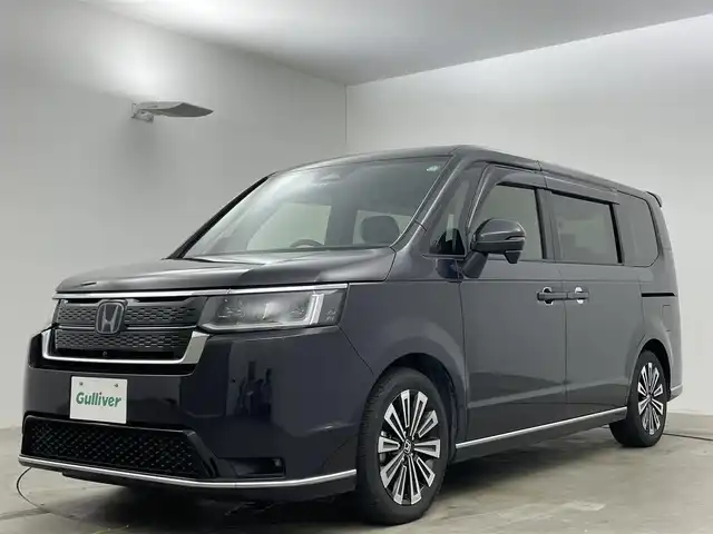 ホンダ ステップワゴン スパーダ eHEV プレミアムライン 岡山県 2022(令4)年 3万km トワイライトミストブラックパール 純正9インチメモリナビ/（CD/DVD/Bluetooth/フルセグ/Carplay）/衝突軽減ブレーキ/両側電動スライドドア/レーダークルーズコントロール/ビルトインETC2.0/LEDヘッドライト/アラウンドビューモニター/ドライブレコーダー/デジタルインナーミラー/電動リアゲート/レーンキープアシスト/オートハイビーム/ブラインドスポットモニター/プッシュスタート/スマートキー×2/ドアバイザー/純正フロアマット/取扱説明書/新車保証書