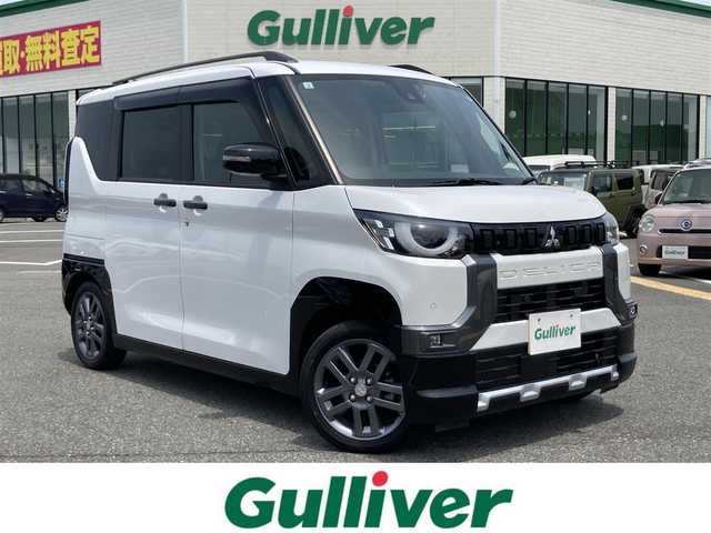 三菱 デリカミニ T プレミアム 鳥取県 2024(令6)年 1.6万km アメジストブラック/シルキーホワイト ターボ車/社外ナビ/CD/DVD/BT/USB/マルチアラウンドモニター/e-Assist・マイパイロット/両側パワースライドドア/ドライブレコーダー・ETC/前席シートヒーター/リアサーキュレーター/電動パーキングブレーキ/パドルシフト/LEDヘットライト/フォグライト/純正15インチアルミホイール/プッシュエンジンスタート/ルーフレール/フロアマット・ドアバイザー
