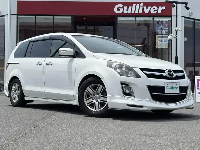 マツダ ＭＰＶ 23S Lパッケージ 宮城県 2013(平25)年 6.7万km クリスタルホワイトパールマイカ 走行距離：66203km/ＢＯＳＥスピーカー/Ｄ＋Ｎ席シートヒーター/純正ナビ/後席モニター（ALPINE）/両側パワースライドドア/パワーバックドア/電動格納サードシート/オットマン/ＥＴＣ/純正フロアマット/Ｄ席パワーシート/純正アルミホイール/エアロ/WAC/バックカメラ/ハーフレザーハンドルカバー/ワンオーナー/AM・FM・BT・TV・DVD・SD・HDMI・IPod