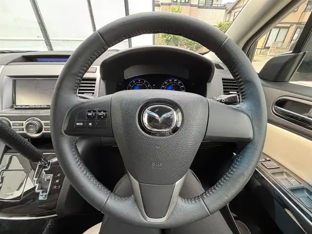 マツダ ＭＰＶ 23S Lパッケージ 宮城県 2013(平25)年 6.7万km クリスタルホワイトパールマイカ 走行距離：66203km/ＢＯＳＥスピーカー/Ｄ＋Ｎ席シートヒーター/純正ナビ/後席モニター（ALPINE）/両側パワースライドドア/パワーバックドア/電動格納サードシート/オットマン/ＥＴＣ/純正フロアマット/Ｄ席パワーシート/純正アルミホイール/エアロ/WAC/バックカメラ/ハーフレザーハンドルカバー/ワンオーナー/AM・FM・BT・TV・DVD・SD・HDMI・IPod