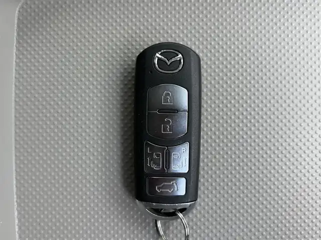 マツダ ＭＰＶ 23S Lパッケージ 宮城県 2013(平25)年 6.7万km クリスタルホワイトパールマイカ 走行距離：66203km/ＢＯＳＥスピーカー/Ｄ＋Ｎ席シートヒーター/純正ナビ/後席モニター（ALPINE）/両側パワースライドドア/パワーバックドア/電動格納サードシート/オットマン/ＥＴＣ/純正フロアマット/Ｄ席パワーシート/純正アルミホイール/エアロ/WAC/バックカメラ/ハーフレザーハンドルカバー/ワンオーナー/AM・FM・BT・TV・DVD・SD・HDMI・IPod