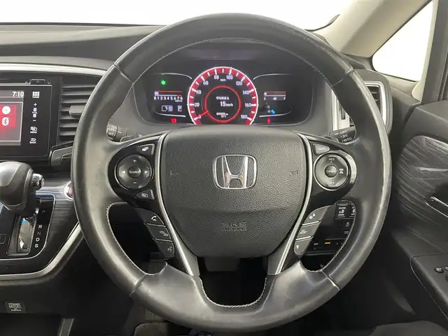 ホンダ オデッセイ アブソルート EX 大分県 2013(平25)年 10万km プレミアムヴィーナスブラックP Hondaインターナビ＋リンクアップフリー＋ＥＴＣ（ナビ連動）/ マルチビューカメラシステム＋スマートパーキングアシストシステム/ リアエンターテインメントシステム/リア左側パワースライドドア＋スライドドアイージークローザー/リア右側パワースライドドア＋スライドドアイージークローザー/LEDアウターウエルカムライト（リアドア＜左右＞）/２列目プレミアムクレイドルシート/コンフォートビューパッケージ/Hondaスマートキーシステム＋プッシュエンジンスタート／ストップスイッチ/トリプルゾーンコントロール・フルオートエアコンディショナー/運転席8ウェイパワーシート/ＬＥＤヘッドライト/ＬＥＤルームランプ/あんしんパッケージ/18インチアルミホイール/ 	ＡＣＣ＋ＣＭＢＳ