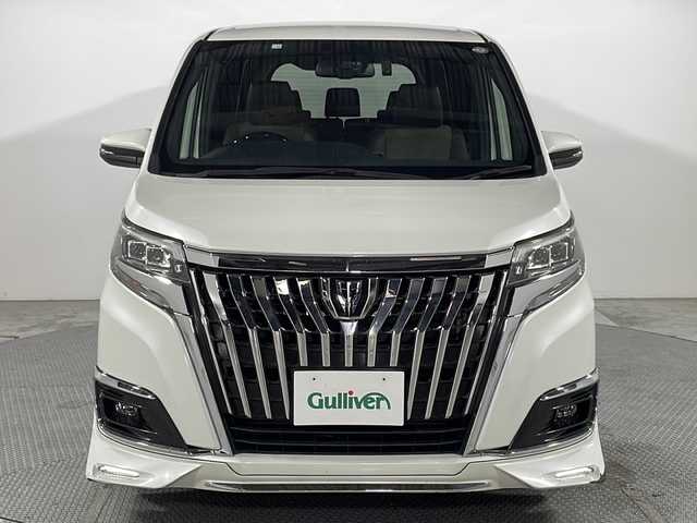 トヨタ エスクァイア Gi プレミアムパッケージ 広島県 2018(平30)年 6万km ホワイトパールクリスタルシャイン 純正10型ナビ（DVD/フルセグTV/Bluetooth）/純正フリップダウンモニター/両側パワースライドドア/バックカメラ/シートヒーター/ステアリングヒーター/セーフティセンス/・プリクラッシュセーフティ/・レーンディパーチャーアラート/・オートマチックハイビーム/クルーズコントロール/LEDヘッドランプ/純正15インチAW/ビルトインETC/ドライブレコーダー
