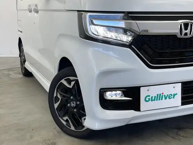 ホンダ Ｎ ＢＯＸ カスタム G L ターボ ホンダセンシング 新潟県 2019(令1)年 5.4万km プラチナホワイトパール ワンオーナー/純正メモリナビ/　フルセグTV/Bluetooth/CD/DVD/USB/衝突被害軽減ブレーキ/レーンキープアシスト/レーダークルーズコントロール/コーナーセンサー/ハーフレザーシート/前席シートヒーター/両側パワースライドドア/バックモニター/ビルトインETC/LEDヘッドライト/アイドリングストップ/横滑り防止装置/オートライト/パドルシフト/ステアリングスイッチ/レザーステアリング/禁煙車
