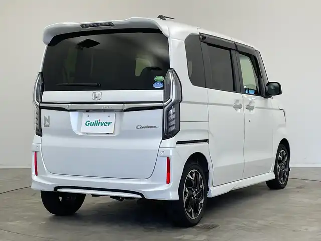 ホンダ Ｎ ＢＯＸ カスタム G L ターボ ホンダセンシング 新潟県 2019(令1)年 5.4万km プラチナホワイトパール ワンオーナー/純正メモリナビ/　フルセグTV/Bluetooth/CD/DVD/USB/衝突被害軽減ブレーキ/レーンキープアシスト/レーダークルーズコントロール/コーナーセンサー/ハーフレザーシート/前席シートヒーター/両側パワースライドドア/バックモニター/ビルトインETC/LEDヘッドライト/アイドリングストップ/横滑り防止装置/オートライト/パドルシフト/ステアリングスイッチ/レザーステアリング/禁煙車