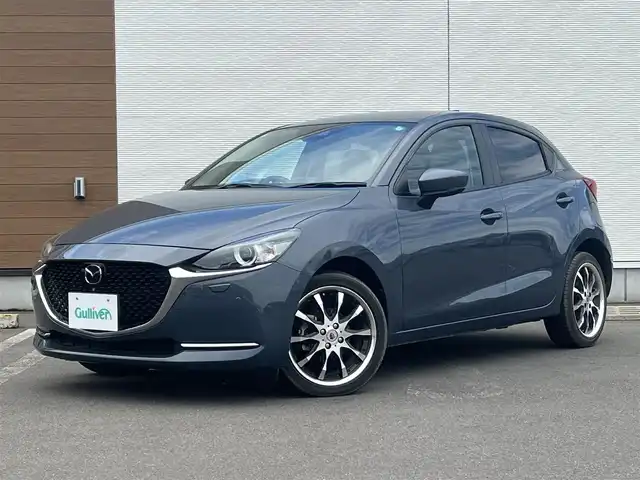 マツダ マツダ２ XD ホワイトコンフォート 秋田県 2020(令2)年 2.4万km ポリメタルグレーM ４WD/ターボ/衝突軽減システム/LEDヘッドライト/純正SDナビ/フルセグ/全方位カメラ（360°ビューモニター）/WORK SCHWERT SW2　17インチアルミ（夏タイヤ装着）/スマートキー/運転席パワーシート/前席シートヒーター/アイドリングストップ/プッシュスタート/コーナーセンサー/レーンキープアシスト/オートマチックハイビーム/クルーズコントロール追従走行有/ブラインドスポットモニター/ステアリングスイッチ/ステアリングヒーター/パドルシフト/ビルトインETC/純正フロアマット/オートライト/オートエアコン/パワーステアリング/パワーウィンドウ/横滑り防止/盗難防止装置/寒冷地仕様/電動格納ウィンカーミラー/キーレスエントリー/保証書/取扱説明書/記録簿/スペアキー1本有